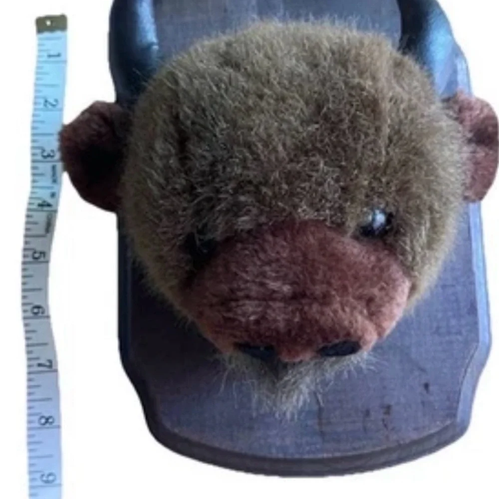 Plush mounted animal heads. Kids room - cabin  humor